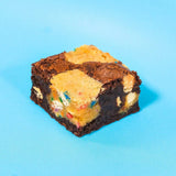Birthday Brookie with moist chocolate brownie, funfetti cookie dough, and caramelised white chocolate chunks.